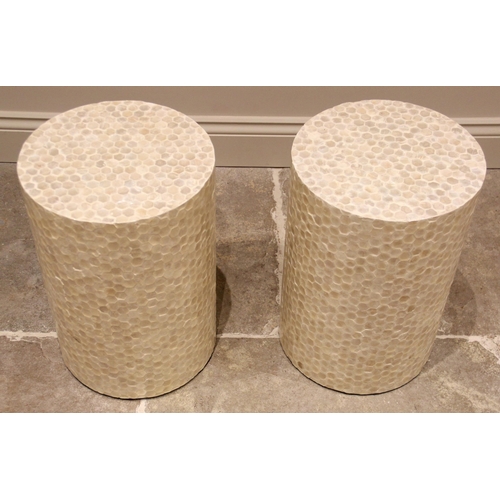 1074 - A pair of contemporary mother of pearl 'honeycomb' pedestals/occasional tables, of cylindrical form,... 