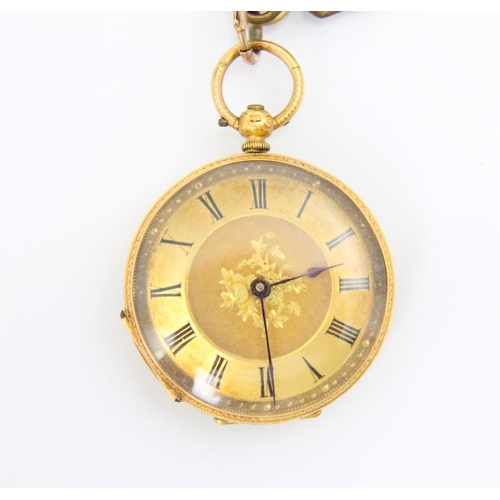 117 - A late 19th century yellow metal ladies fob watch, the gold coloured dial with central engraved flor... 