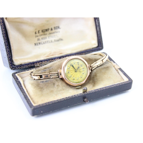 121 - A 20th century Kemp and Son 9ct ladies wristwatch, the gold coloured dial with Arabic numerals, set ... 