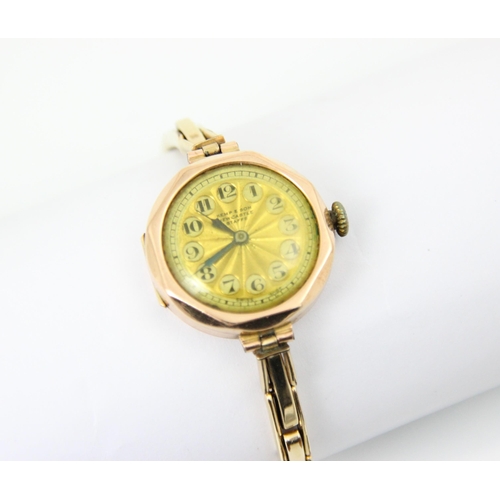 121 - A 20th century Kemp and Son 9ct ladies wristwatch, the gold coloured dial with Arabic numerals, set ... 