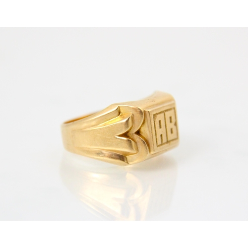 130 - A French 18ct yellow gold signet ring, the rectangular raised cartouche with 'AB' initial, leading t... 