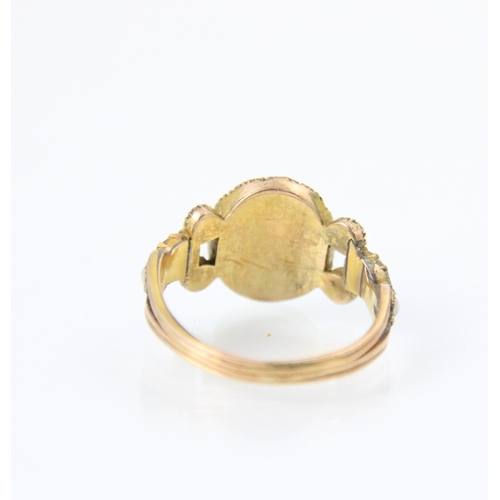 137 - A 19th century split pearl and red stone ring, the red stone centre (possibly foil backed) with surr... 