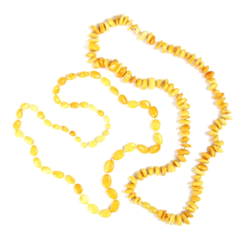 162 - A string of butterscotch coloured amber beads, the non uniform disc shaped beads, with a further str... 