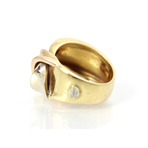 171 - A yellow metal dress ring, the stylised ribbon detailed ring with wide plain polished band, ring siz... 