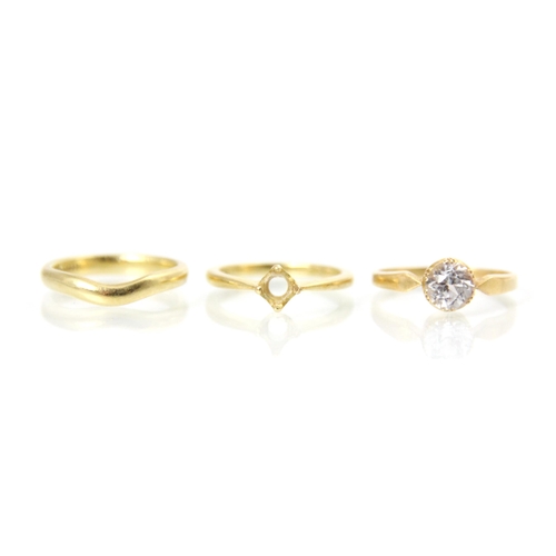 183 - A selection of three rings, including a 18ct yellow gold Boodles & Dunthorne ring mount, ring size L... 