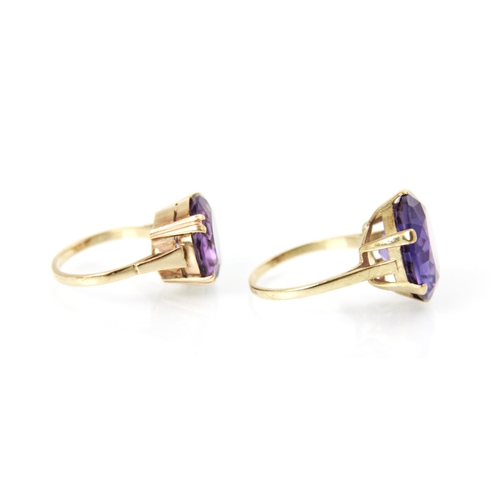 190 - An amethyst dress ring, the round cut purple stone within a yellow metal mount, ring size P, and a f... 