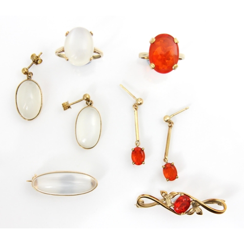 192 - A suite of untested fire opal jewellery, including a 9ct yellow gold dress ring set with an oval cut... 