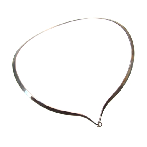 198 - A Georg Jensen Torun necklace, designed by Vivianna Torun, the plain polished collar style necklace ... 