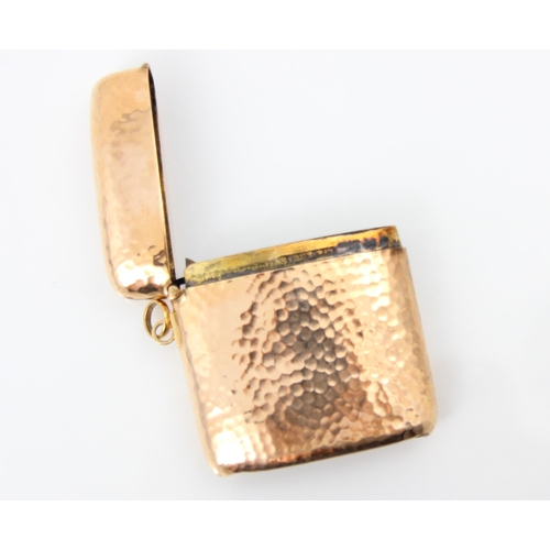 233 - An Edwardian 9ct rose gold vesta case, the planished vesta case stamped 'H&A' Birmingham 1906, 5cm l... 