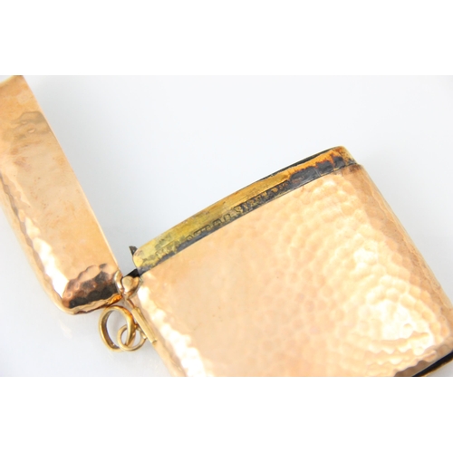 233 - An Edwardian 9ct rose gold vesta case, the planished vesta case stamped 'H&A' Birmingham 1906, 5cm l... 