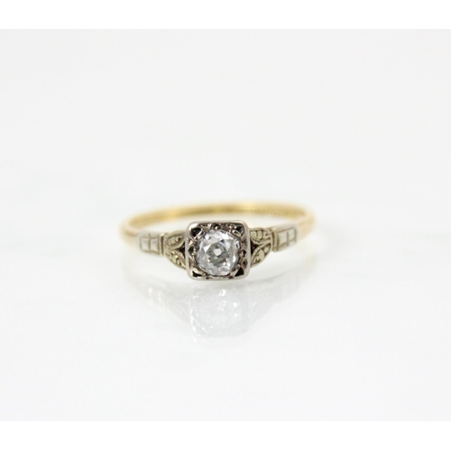 237 - A 20th century diamond solitaire ring, the old cut diamond within white metal topped square rub over... 