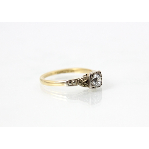 237 - A 20th century diamond solitaire ring, the old cut diamond within white metal topped square rub over... 