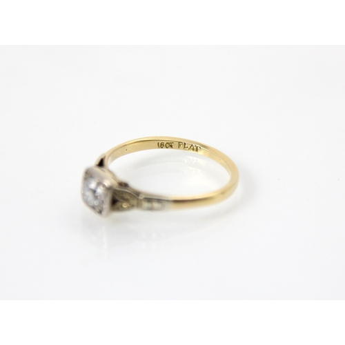 237 - A 20th century diamond solitaire ring, the old cut diamond within white metal topped square rub over... 