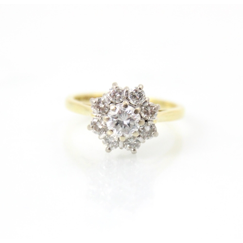 245 - An Edwardian style 18ct yellow gold diamond cluster ring, the central round cut diamond within a sur... 