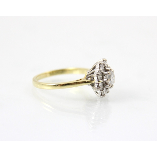 245 - An Edwardian style 18ct yellow gold diamond cluster ring, the central round cut diamond within a sur... 