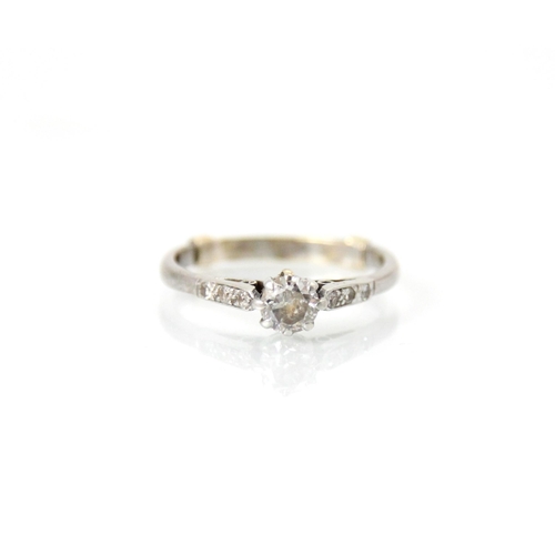 262 - A 20th century diamond solitaire ring, the central transitional cut diamond with mixed cut diamond s... 