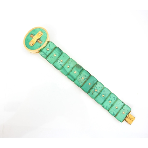 269 - A malachite set bracelet, the twelve panels with oval malachite set locket to centre, tongue and box... 