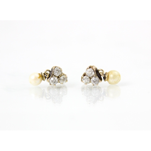 275 - A pair of diamond and cultured pearl earrings, the three old cut diamonds in a trefoil design suspen... 