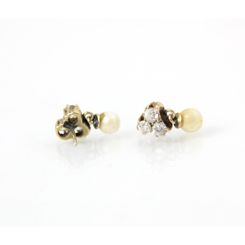 275 - A pair of diamond and cultured pearl earrings, the three old cut diamonds in a trefoil design suspen... 