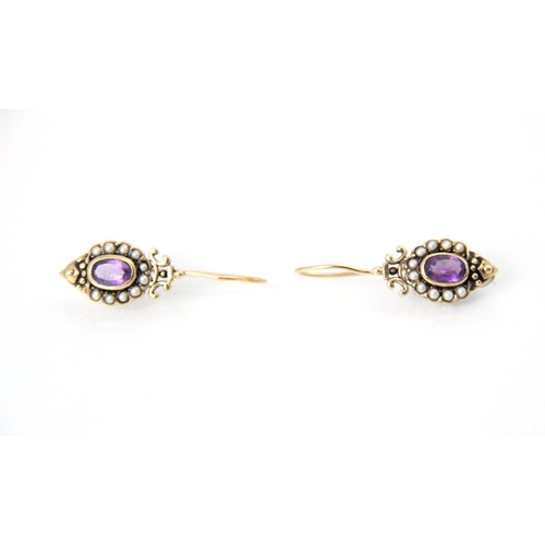 278 - A pair of yellow metal amethyst and cultured pearl earrings, the cluster designed earrings with oval... 