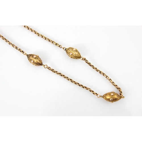 287 - A 19th century yellow metal chain, the engraved links of the chain lead to three lozenge shaped link... 