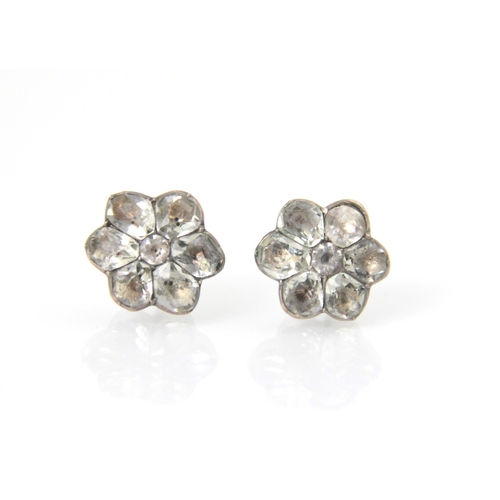 289 - A pair of black dot paste and white metal earrings, the cluster designed earrings with paste set ‘pe... 