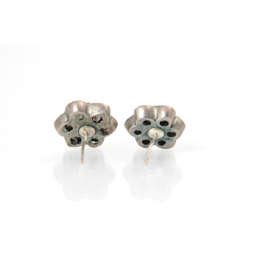 289 - A pair of black dot paste and white metal earrings, the cluster designed earrings with paste set ‘pe... 