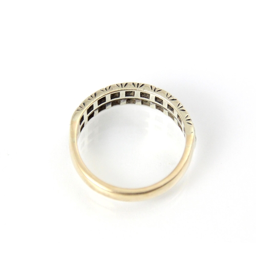 290 - A diamond set double half eternity ring, the rows of round cut stones set within spitch set white me... 