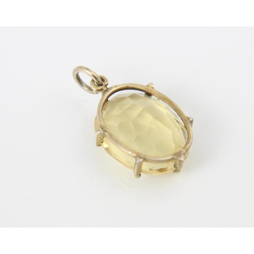 293 - A citrine set pendant, the oval cut citrine set within a claw set yellow metal mount, with a circula... 