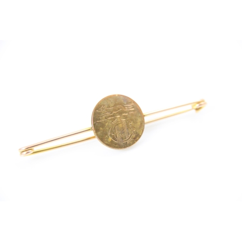 306 - Two 'Grove Hunt' stick pins, the yellow metal bar with applied circular disc depicting fox and monog... 