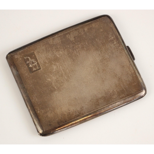 73 - A silver cigarette case, possibly E J Trevitt & Sons, Birmingham 1947, the rectangular case with eng... 