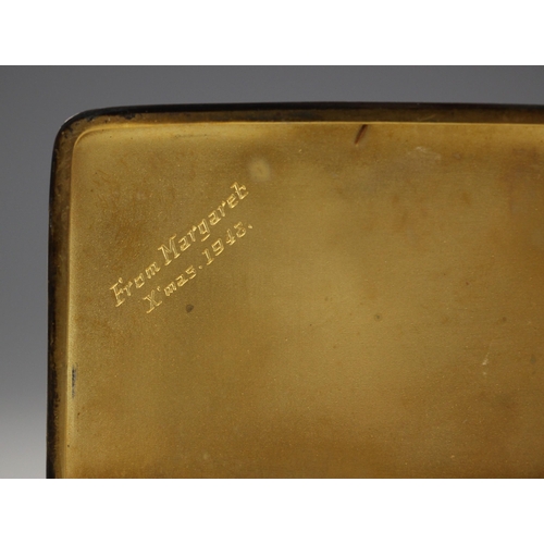 73 - A silver cigarette case, possibly E J Trevitt & Sons, Birmingham 1947, the rectangular case with eng... 