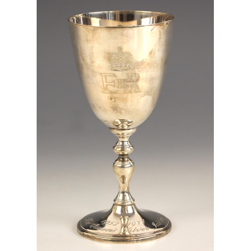 75 - An Elizabeth II commemorative silver chalice, Courtman Silver Ltd, London 1977, of typical form with... 