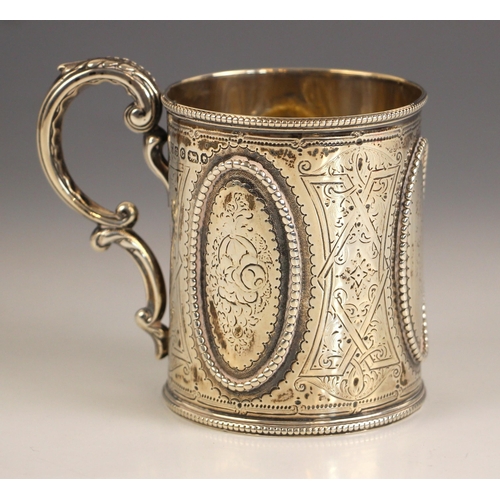 82 - A Victorian silver christening mug, Martin, Hall & Co., Sheffield 1870, the cast acanthus capped han... 