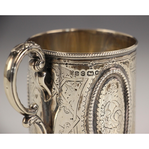 82 - A Victorian silver christening mug, Martin, Hall & Co., Sheffield 1870, the cast acanthus capped han... 