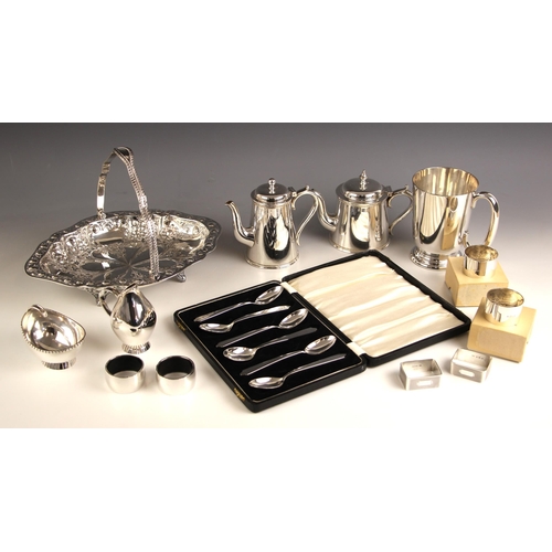 88 - A selection of silver plate and silver items, including a silver plate swing handled basket with flo... 