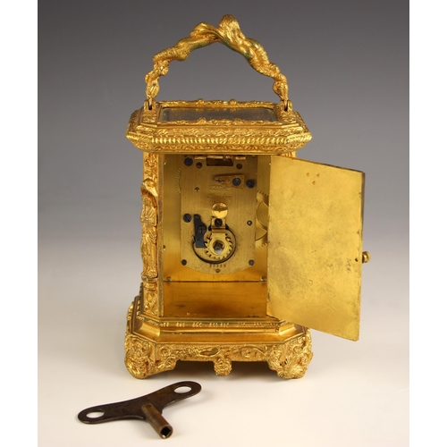 895 - An Elliott gilt metal carriage timepiece, late 20th century, retailed by Batty of Manchester, the el... 