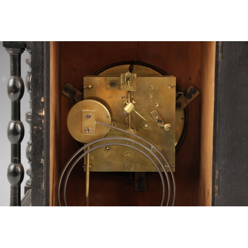 899 - A Lenz Kirch ebonised Aesthetic Movement bracket clock, late 19th century, the castellated case with... 