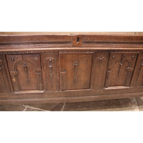 904 - A 17th/18th century oak coffer, the moulded plank top opening to a later lined interior and a fitted... 