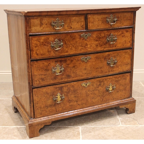 907 - A burr elm chest of drawers, early 18th century, the quarter veneered and cross banded top over an a... 