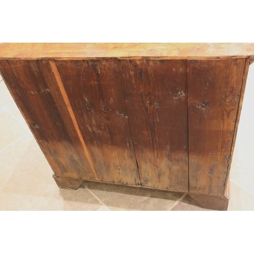 907 - A burr elm chest of drawers, early 18th century, the quarter veneered and cross banded top over an a... 