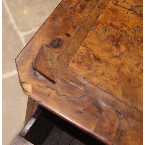 907 - A burr elm chest of drawers, early 18th century, the quarter veneered and cross banded top over an a... 