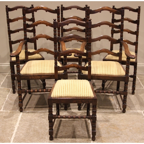 913 - A set of six 18th century style oak ladder back dining chairs, mid 20th century, each with a drop-in... 