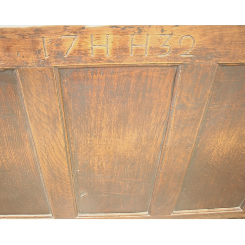 916 - A George II oak Welsh box settle, the high back carved with the initials 'H.H' and the year 1732, ab... 