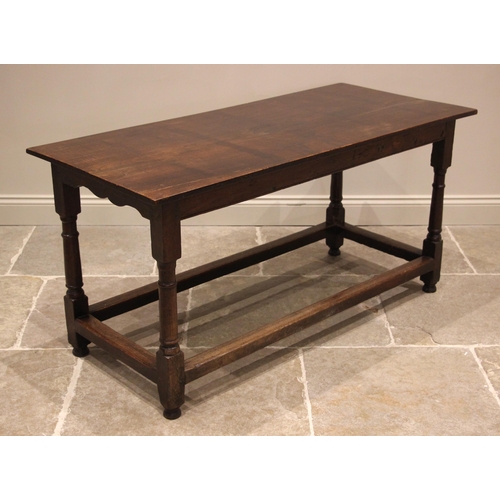 918 - An 18th century style country oak and elm table, late 19th/early 20th century, the rectangular top u... 