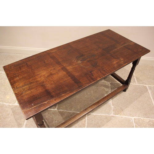 918 - An 18th century style country oak and elm table, late 19th/early 20th century, the rectangular top u... 