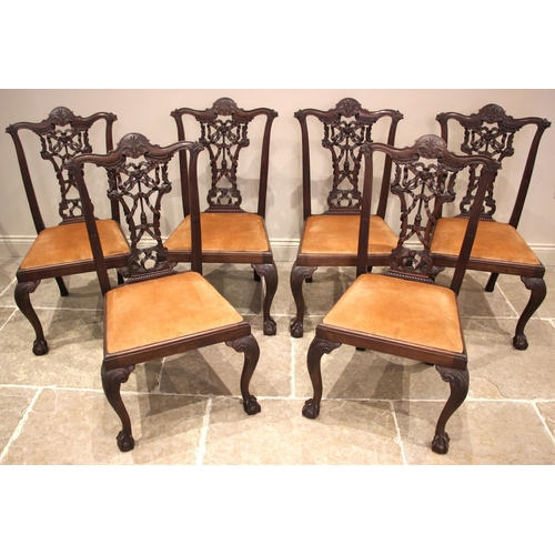 924 - A set of eight mahogany Chippendale style dining chairs, early 20th century, each with a ribbon tied... 