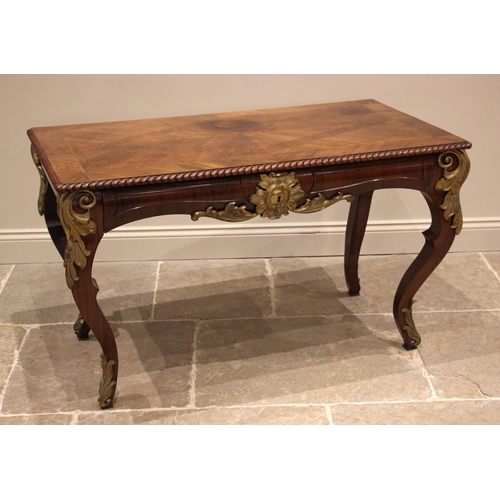 932 - A French Louis XV style rosewood hall or side table, early 20th century, the quarter veneered and cr... 