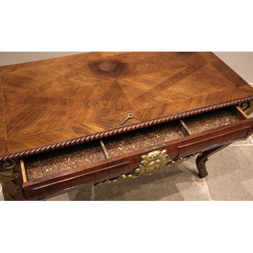 932 - A French Louis XV style rosewood hall or side table, early 20th century, the quarter veneered and cr... 