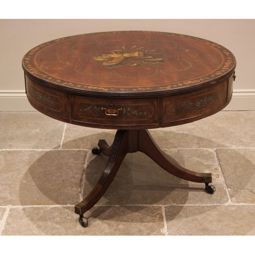 936 - A George III mahogany drum table in the manner of Sheraton, the circular top centred with a polychro... 